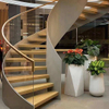 Floating Stairs with Curved Glass Railing Solid Structure Curtain Wall for Hall Supermarket Hospital Hotel School Use