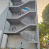 Outdoor Galvanized Steel Metal Fire Escape Stairs Serrated Step Grating Stainless Steel Warehouse Building for Metal Railings